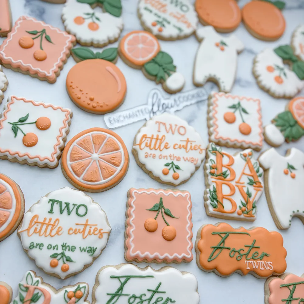 Detailed tier example: Two Little Cuties orange twins baby shower cookie set